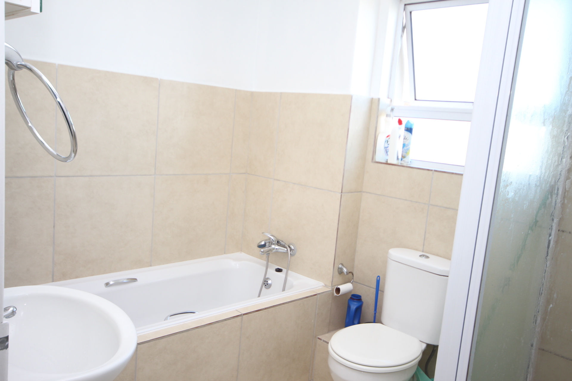 Bathroom with bath and shower